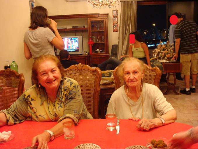 A group of women sitting at a table

Description automatically generated