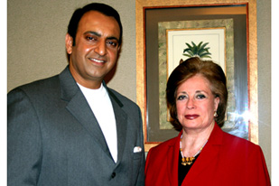 Riz Khan with Jihan Sadat.jpg