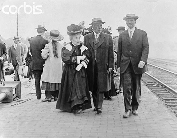 Mr. and Mrs. John D. Rockefeller Sr. Strolling at Train Station.jpg